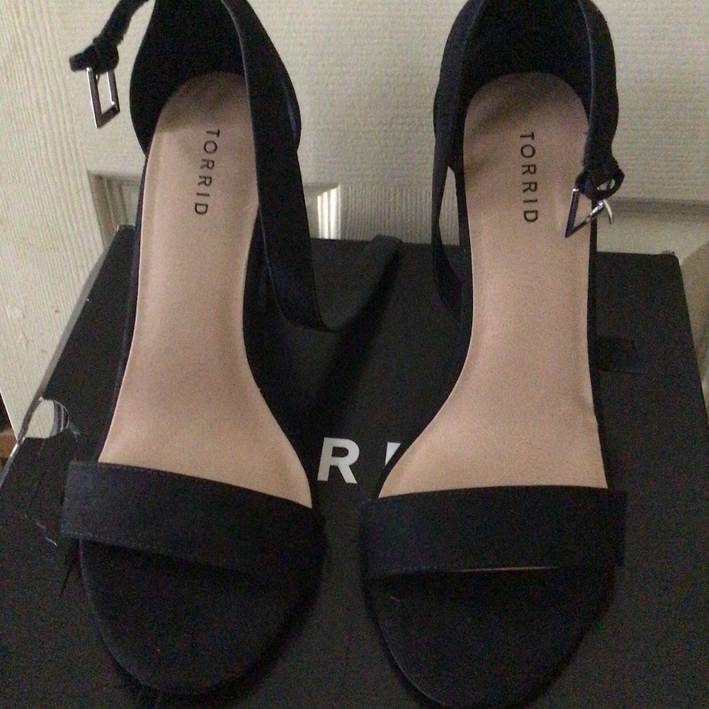 Black strapped heels